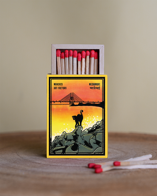 Matchbox with artistic design of the famous Worli Sea link in mumbai with a cat on the worli  on a wooden surfaceea shore front